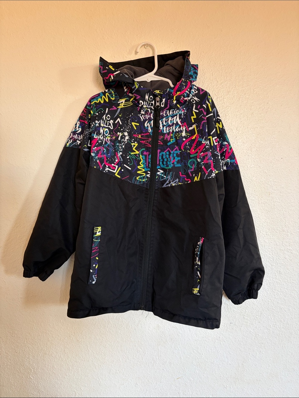 Kids Black Hooded Jacket with Colorful Graphic Yoke